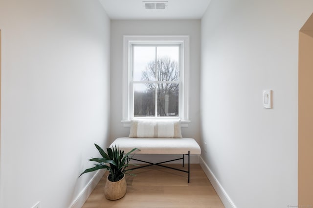 sitting room with light wood-type flooring