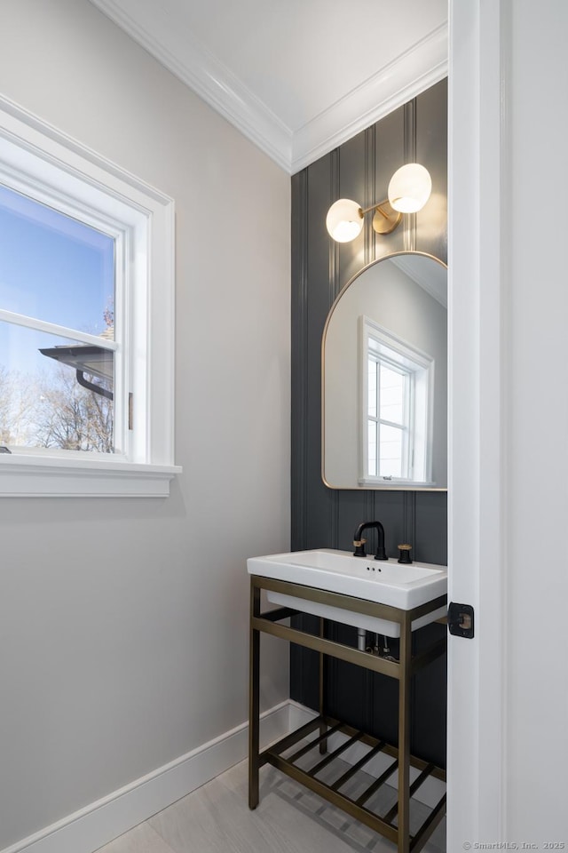 bathroom with crown molding