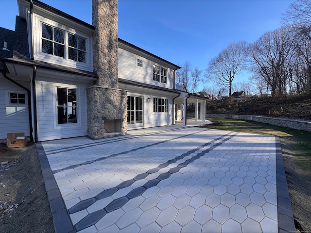 rear view of house with a patio area