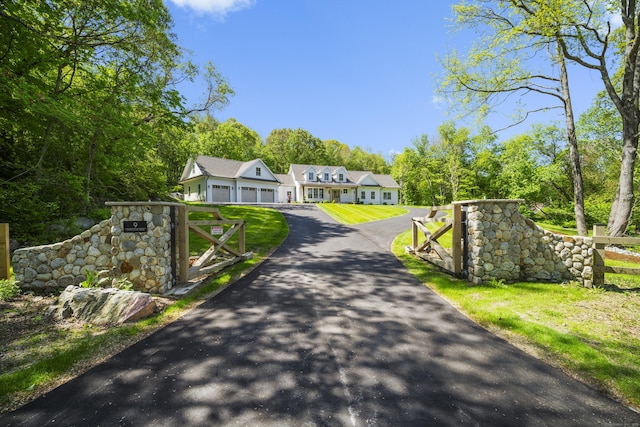 9 Overlook Dr, Old Saybrook, CT 06475 - view of asphalt driveway with a gated entry