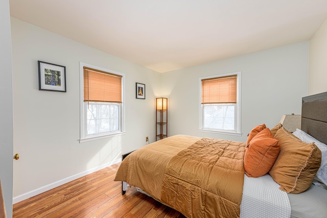 bedroom with wood-type flooring