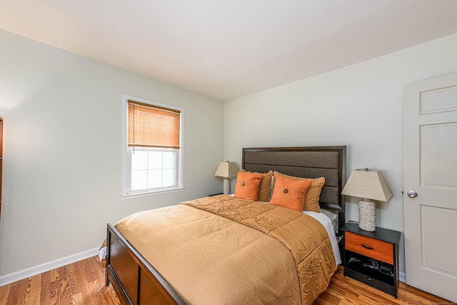 bedroom featuring light hardwood / wood-style floors