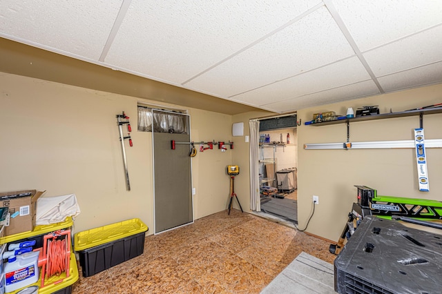 game room featuring a drop ceiling