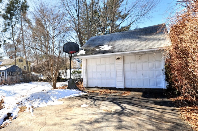 view of snow covered garage