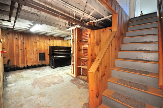 basement with wooden walls