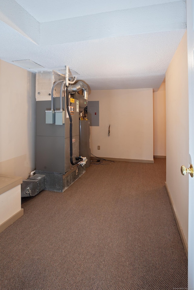 basement featuring carpet floors, electric panel, water heater, and a textured ceiling