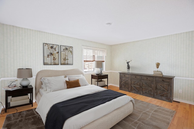 bedroom featuring hardwood / wood-style floors