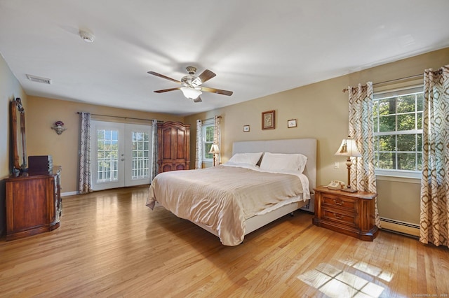 bedroom with ceiling fan, access to exterior, light hardwood / wood-style floors, a baseboard radiator, and french doors