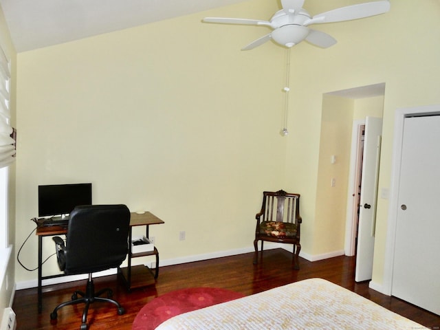 bedroom with ceiling fan, dark hardwood / wood-style flooring, vaulted ceiling, and a baseboard radiator