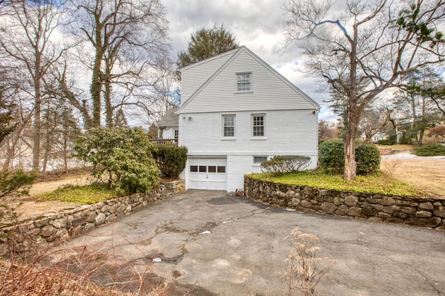 view of home's exterior with a garage