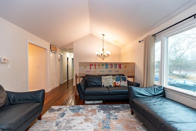 living room with lofted ceiling, a notable chandelier, and dark hardwood / wood-style floors