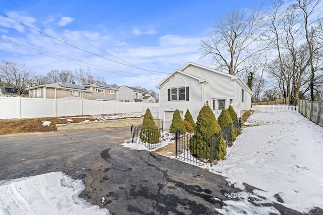 view of snow covered property