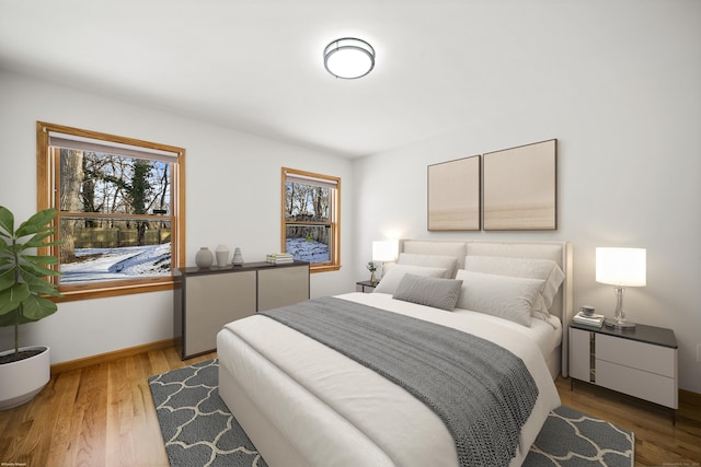 bedroom featuring wood-type flooring