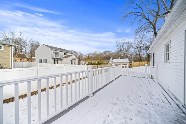 view of snow covered deck