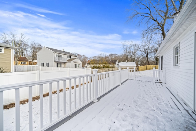 view of snow covered deck