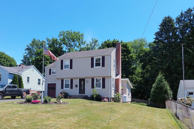 view of front of home featuring a front yard