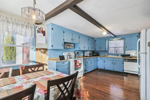 kitchen featuring blue cabinetry, white appliances, and decorative light fixtures