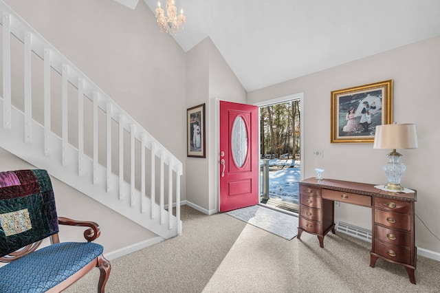 carpeted entrance foyer featuring vaulted ceiling and an inviting chandelier