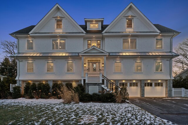 view of front of property featuring a garage