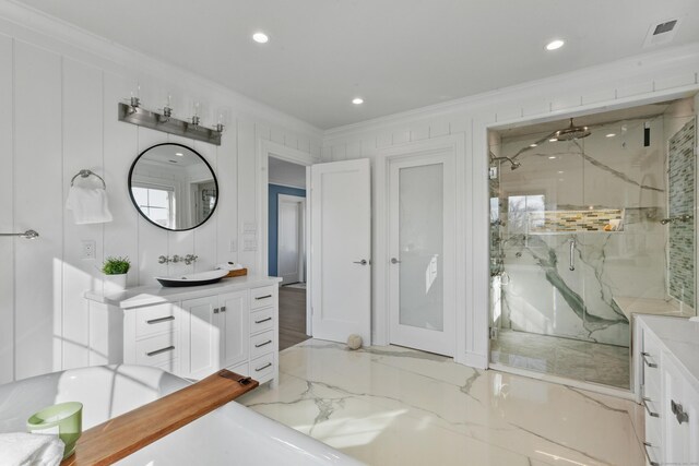 bathroom featuring walk in shower, ornamental molding, and vanity