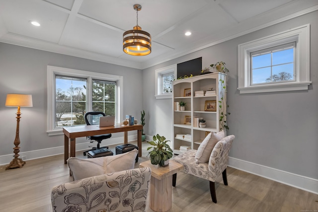 office featuring crown molding, coffered ceiling, a wealth of natural light, and light hardwood / wood-style floors