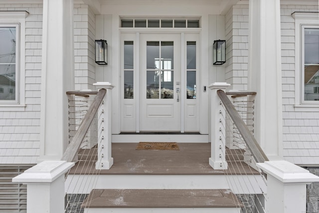 doorway to property featuring a porch