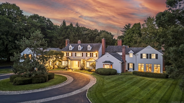 colonial house with a yard