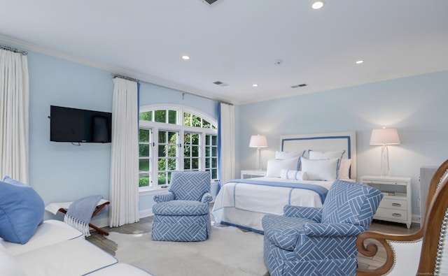 bedroom with ornamental molding