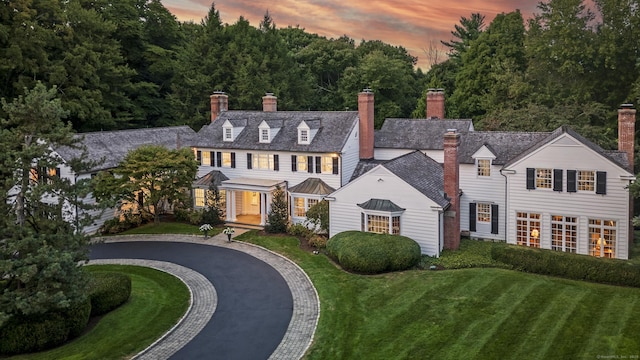 colonial house with a lawn