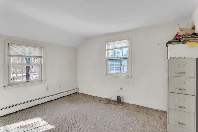 bonus room featuring lofted ceiling, a baseboard heating unit, and light colored carpet