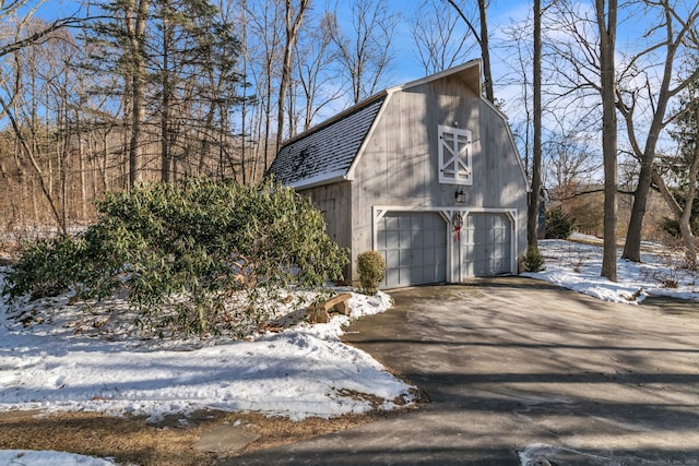 view of snow covered garage