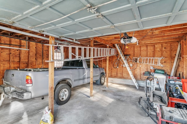 garage featuring a garage door opener