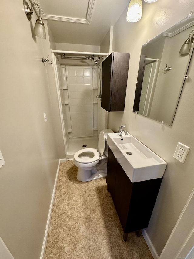 bathroom with walk in shower, vanity, and toilet