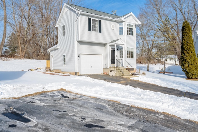 front of property featuring a garage