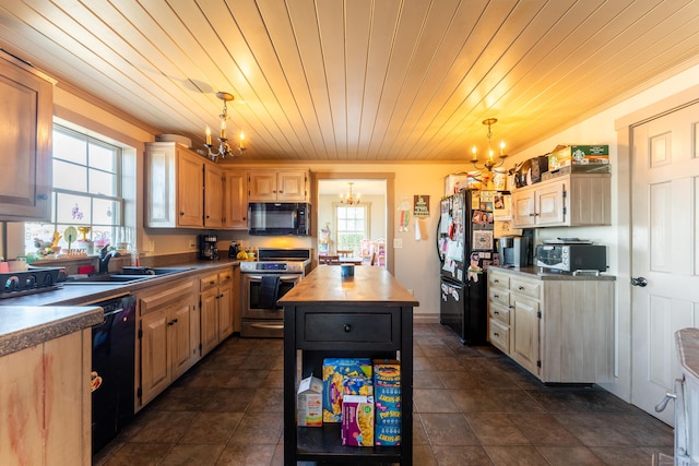 kitchen featuring an inviting chandelier, decorative light fixtures, sink, and black appliances