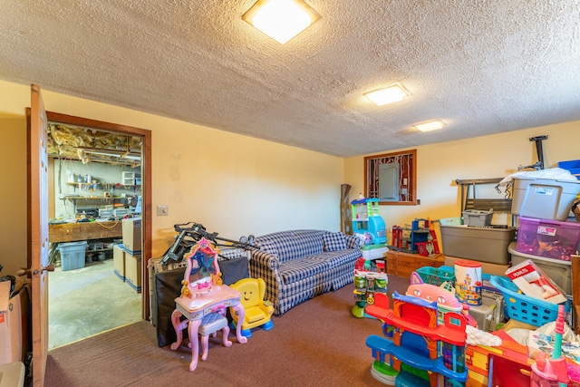 rec room with a textured ceiling