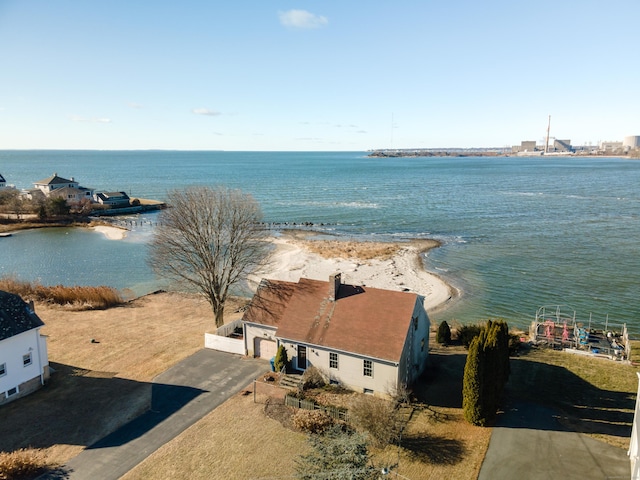 bird's eye view with a view of the beach and a water view