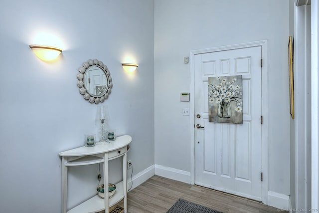 foyer entrance featuring light wood-type flooring