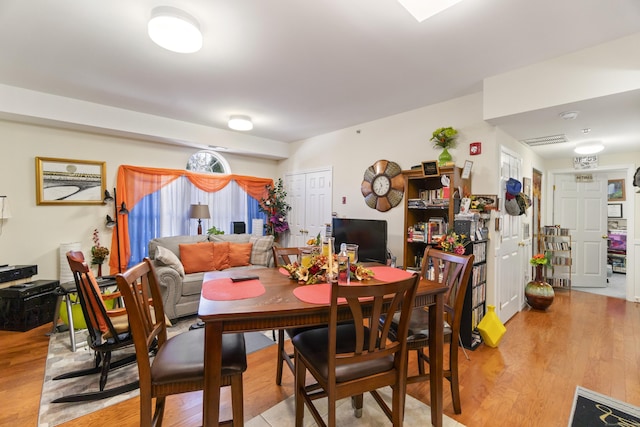 dining room featuring light wood-type flooring