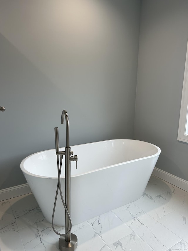 bathroom with a washtub