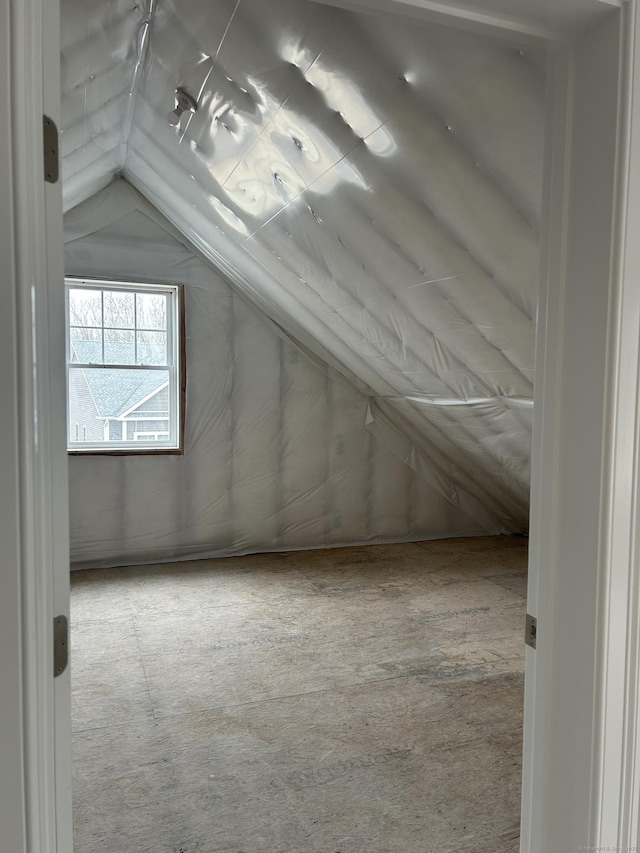 bonus room featuring lofted ceiling