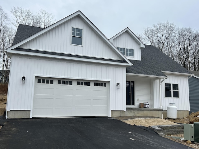 view of front of property with a garage