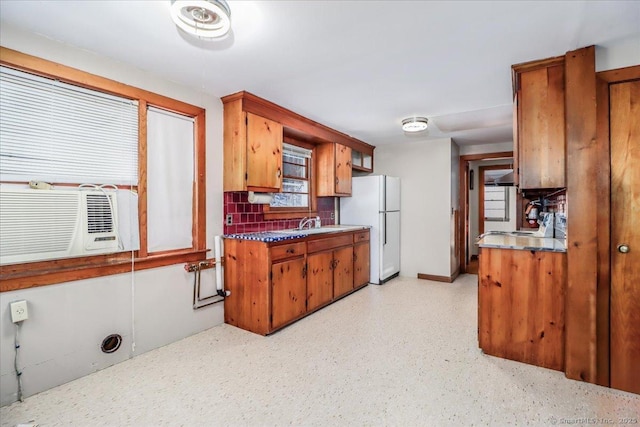 kitchen featuring tasteful backsplash, ventilation hood, sink, cooling unit, and white refrigerator