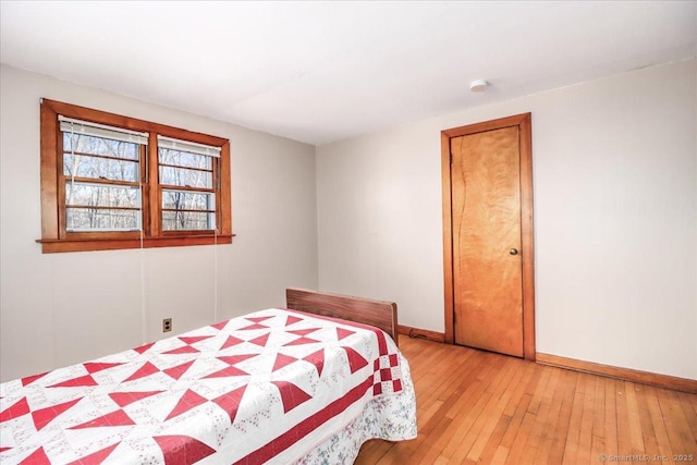 bedroom with light hardwood / wood-style flooring