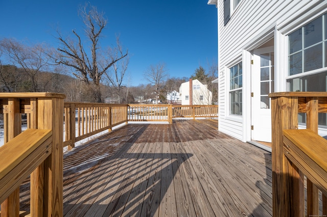 view of snow covered deck