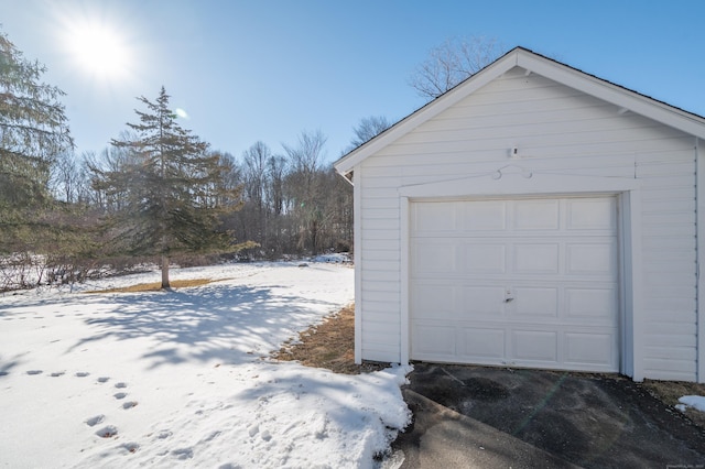 view of snow covered garage