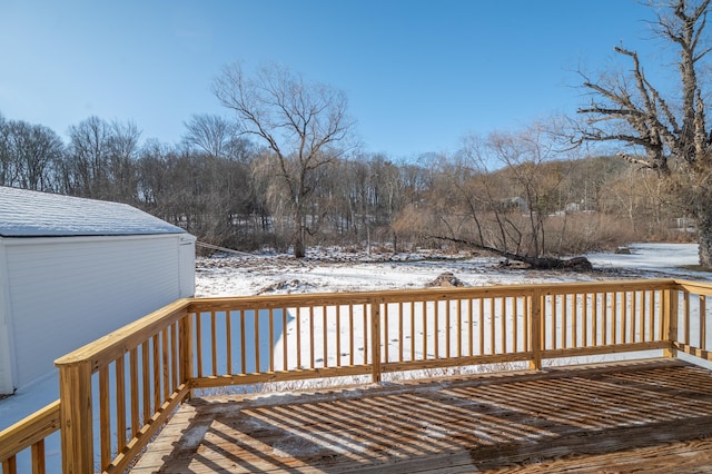 view of snow covered deck