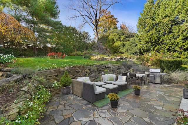 view of patio featuring area for grilling, an outdoor hangout area, and outdoor dining space