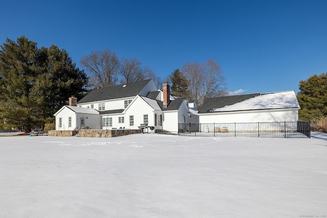 view of snow covered property