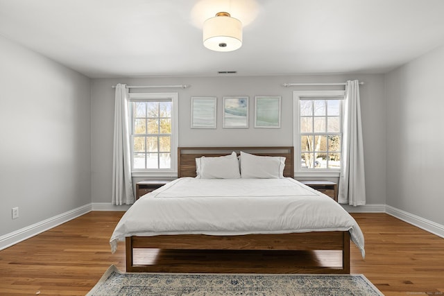 bedroom featuring hardwood / wood-style flooring